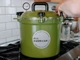 All American 921 pressure canner heating on stove