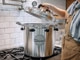 All American 941 pressure canner heating on stove