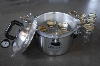 Inside view of All American 910 canner with pint jars loaded.