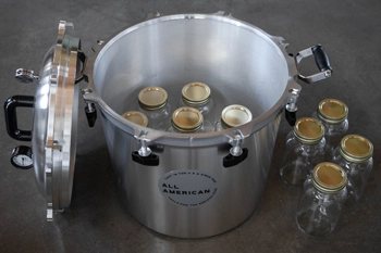 Inside view of All American 941 canner with quart jars loaded.